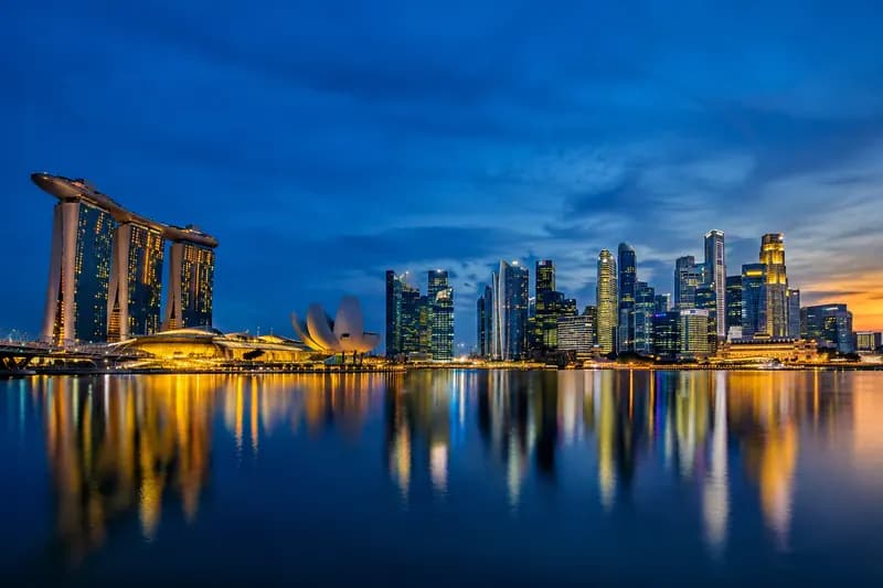 Singapore’s central business district across the bay at blue hour